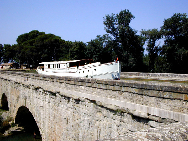 The Luxury Cruise ship, Roi Soleil, crossing the river Cesse aqueduct