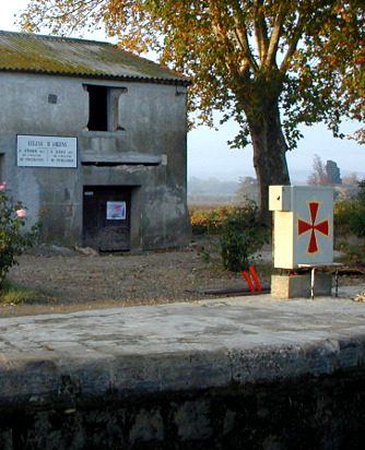 The control box for the Argens lock, sporting an Occitan Cross