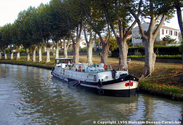 A Hôtel barge moored for the winter in Marseillette on the Midi Canal