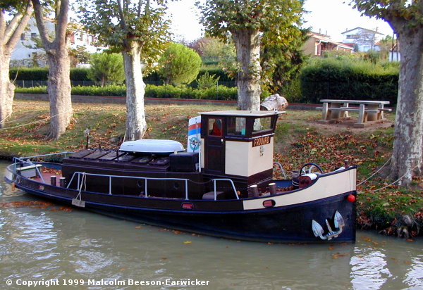 Tug-boat moored for the winter in Marseillette on the Midi Canal