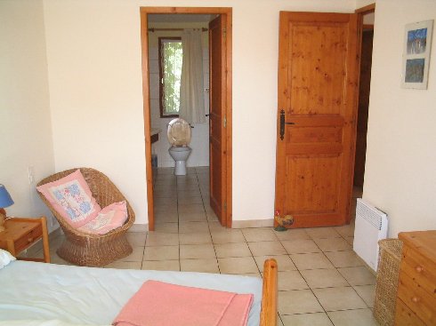 Master bedroom with en-suite bathroom in canalside rental property